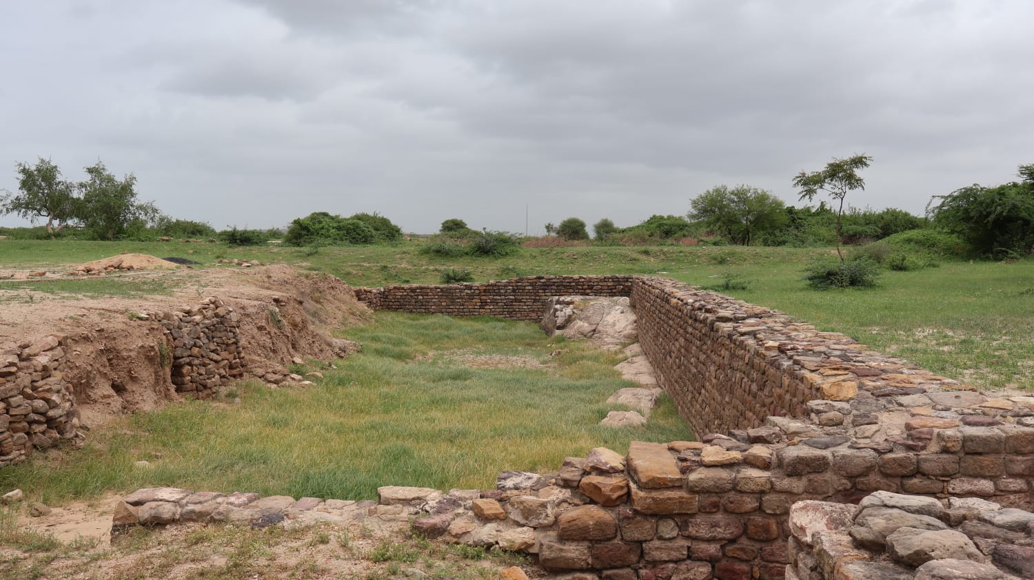 Stone-lined water reservoir remains at a Harappan archaeological site