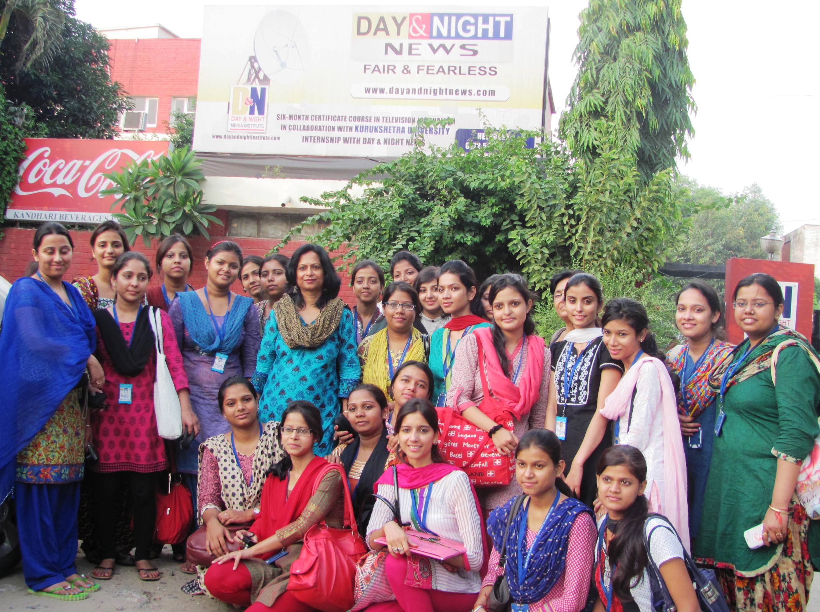 The project trip group together outside a media and industry visit