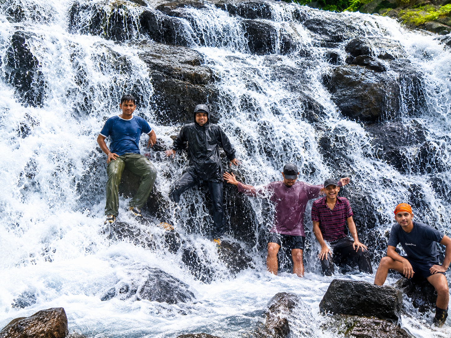 Students at a waterfall on an outbound camp