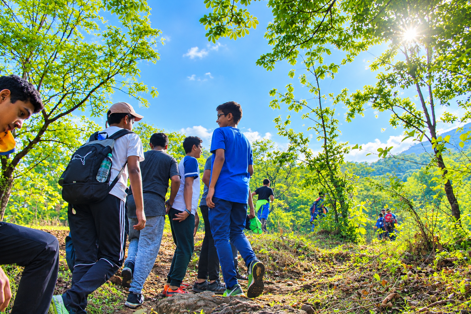 Students walking a forest trail on an outbound camp