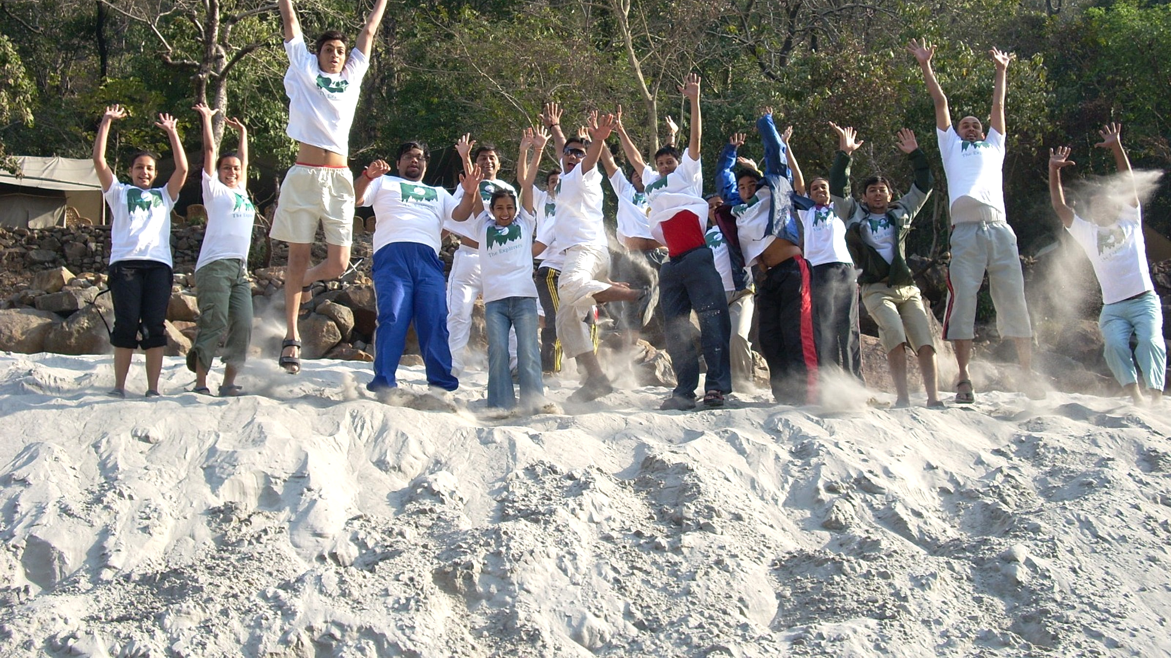 Students celebrating together at an outbound campsite